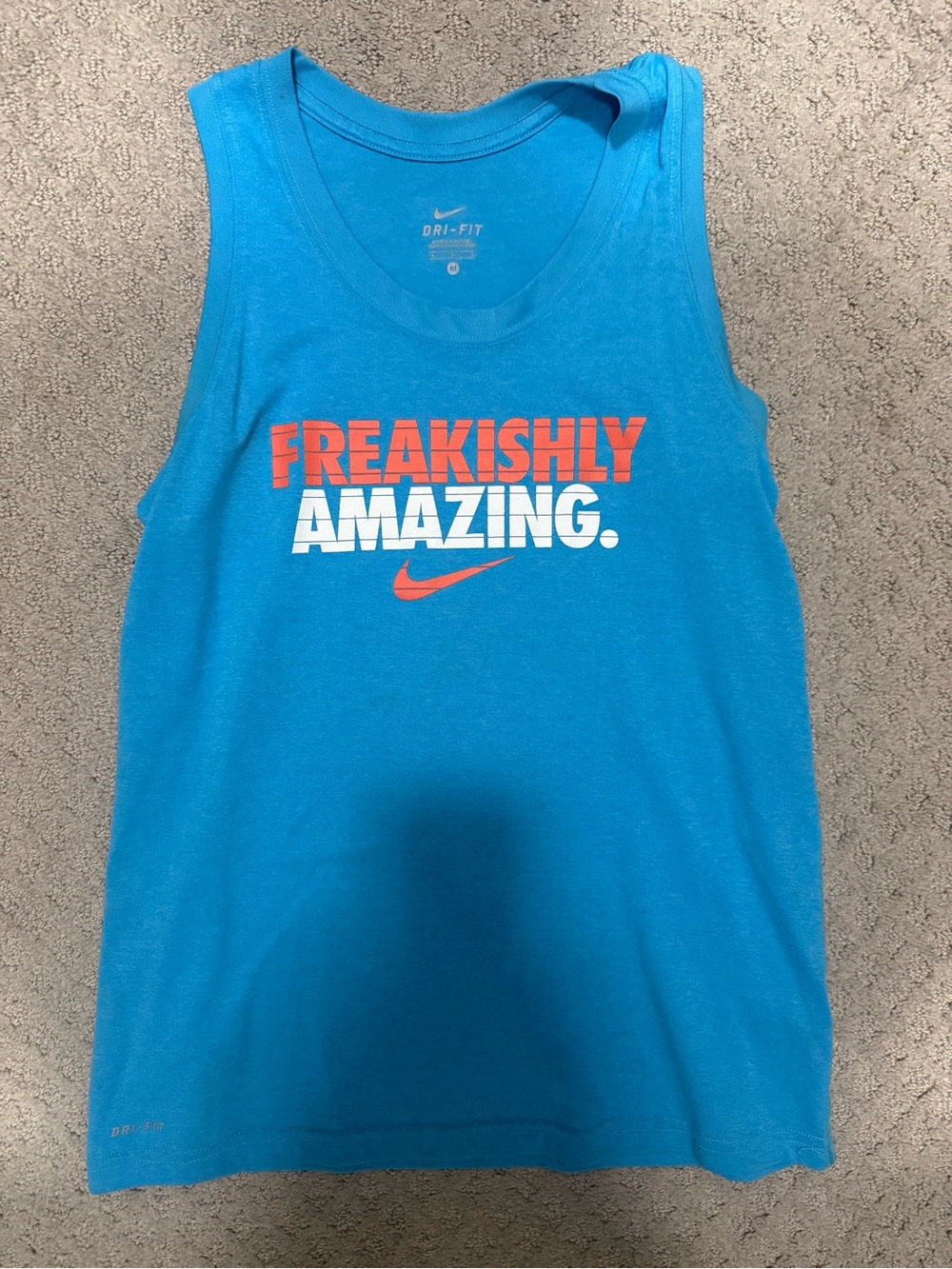 Nike Blue Tank Top with Orange and White 'Freakishly Amazing' Graphic